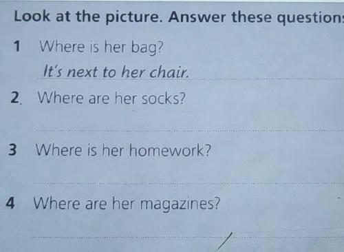 Look at the picture. Answer these questions about Katie's things. 1 Where is her bag?It's next to he